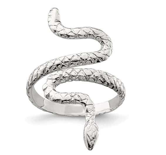 A stylish collection of fancy snake rings in gold, silver, and gemstone designs displayed on a velvet tray.