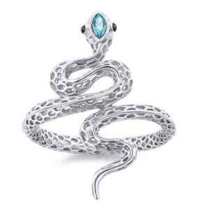 A stylish collection of fancy snake rings in gold, silver, and gemstone designs displayed on a velvet tray.